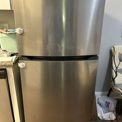 Refrigerator With Top Freezer