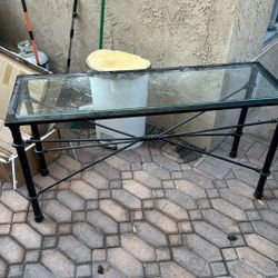 glass-top console table