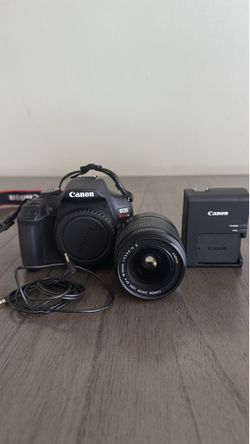 Canon EOS Rebel T7 DSLR Camera + 18–55mm Lens, Charger & Canon Bag