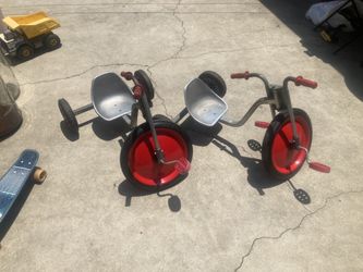 2 Vintage Angeles Tricycles. $40 for both.