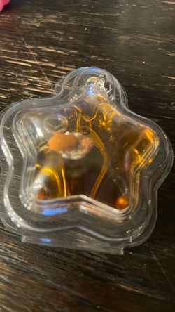 Star-Shaped Glass Ornament with Amber Liquid