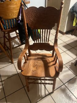 Solid oak arm hand carved arm chair