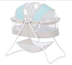 Dream On Me Karley Bassinet in Blue and Grey, Quick Fold and Easy to Carry, Large Storage Basket

New