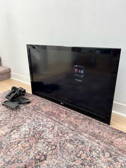 LG 42” Flatscreen TV + Wall Mount
