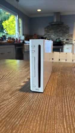 Nintendo Wii Bundle – 2 Controllers, MotionPlus, Mario Kart + Mario Games, Ready to Play