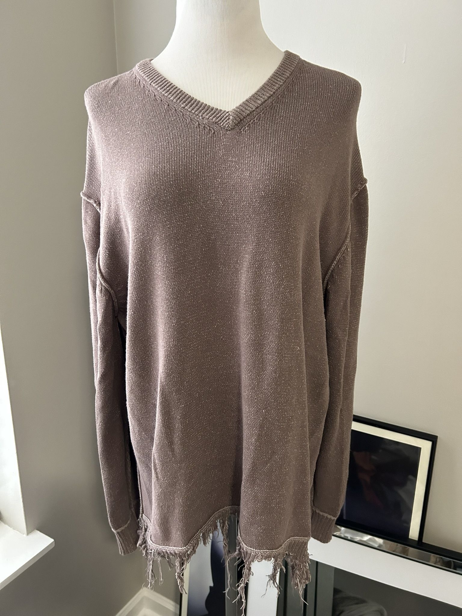 Woman’s V Neck Fringe Sweater