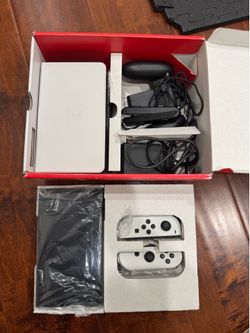 Nintendo switch OLED with all accessories in mint condition