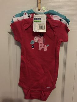 Brand new 3 of onesie set. Size 3-9 months