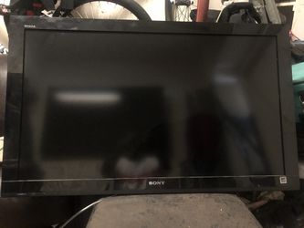 40” Sonya tv with remote and tv stand