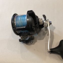   Shimano Torium 16HG Saltwater Fishing Reel-GOOD SHAPE-Loaded with BRAID Line