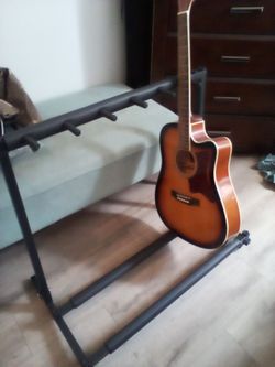 Guitar stand adjustable holds 5 guitars very durable and easy set up for moving