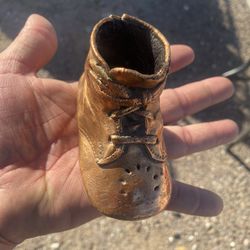 I have a pair of collectible copper shoes for sale, I'm asking $25 for the pair, firm price.