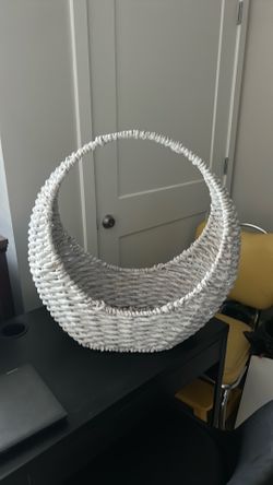 White wicker flower basket