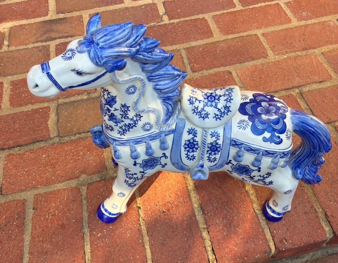 Blue and white glass horses