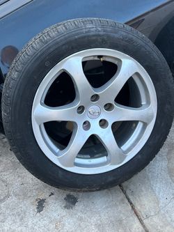 1 only 17 “ inch OEM Nissan / Infiniti wheel , tire 215/55/17