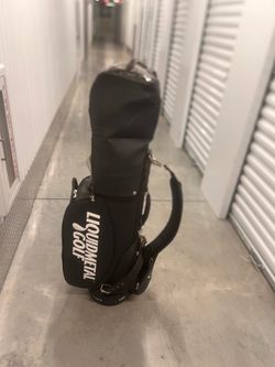 LiquidMetal Golf Cart Staff Bag w/ 6-way Dividers VINTAGE W/ Rain Cover Clean. Pre owned in good with minor cosmetic blemishes. The is se blemishes ar