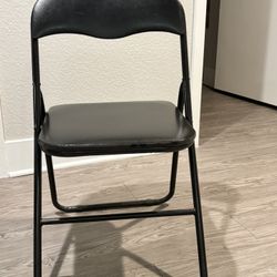 Set Of 4 Black Vinyl Padded Steel Frame Folding Chairs