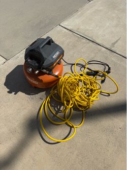 RIGID pancake air compressor with hose and nozzle
