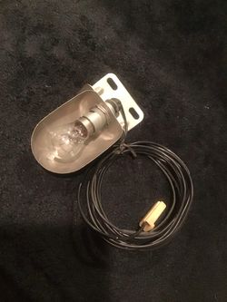 ORIGINAL IMPALA HOOD LAMP
