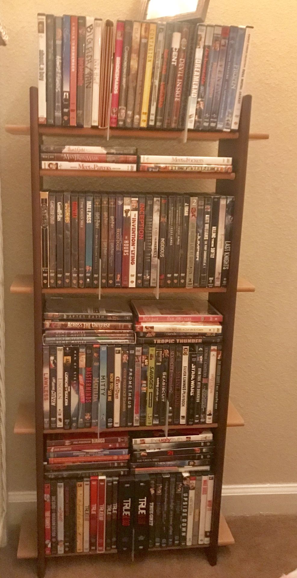 DVD/ CD rack, assorted movies