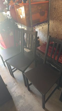 3 wooden IKEA chairs
