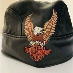 Harley Davidson Genuine Leather Skull Cap and a Vintage 1999 Black Harley Davidson Motorcycle Helmet With Visor…