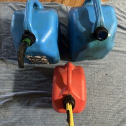 2) 10 Gallon Gas Can And 1 ) Small Gas Can 