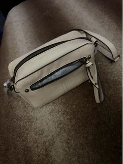 wallet with a cream-colored pocket