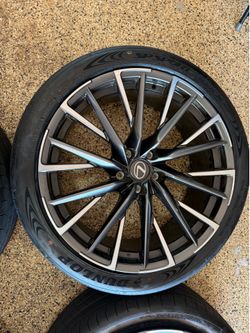 LC500 NEW 21-in staggered-width split-five-spoke forged alloy wheels with Black finish and Bright Silver Chrome accents w new tires.
