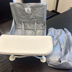 Selling a slightly used Hiccapop OmniBoost Travel Booster Seat / highchair with Tray in Slate Gray.  We used this a few times in our motorhome/camping