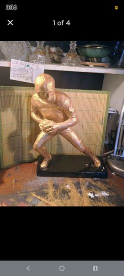 Vintage bronze sculpture. Football figure from Austin Productions. "The Scrambler"
