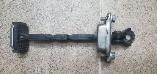 09-12 Acura TL Door Stopper. Front Driver L side.