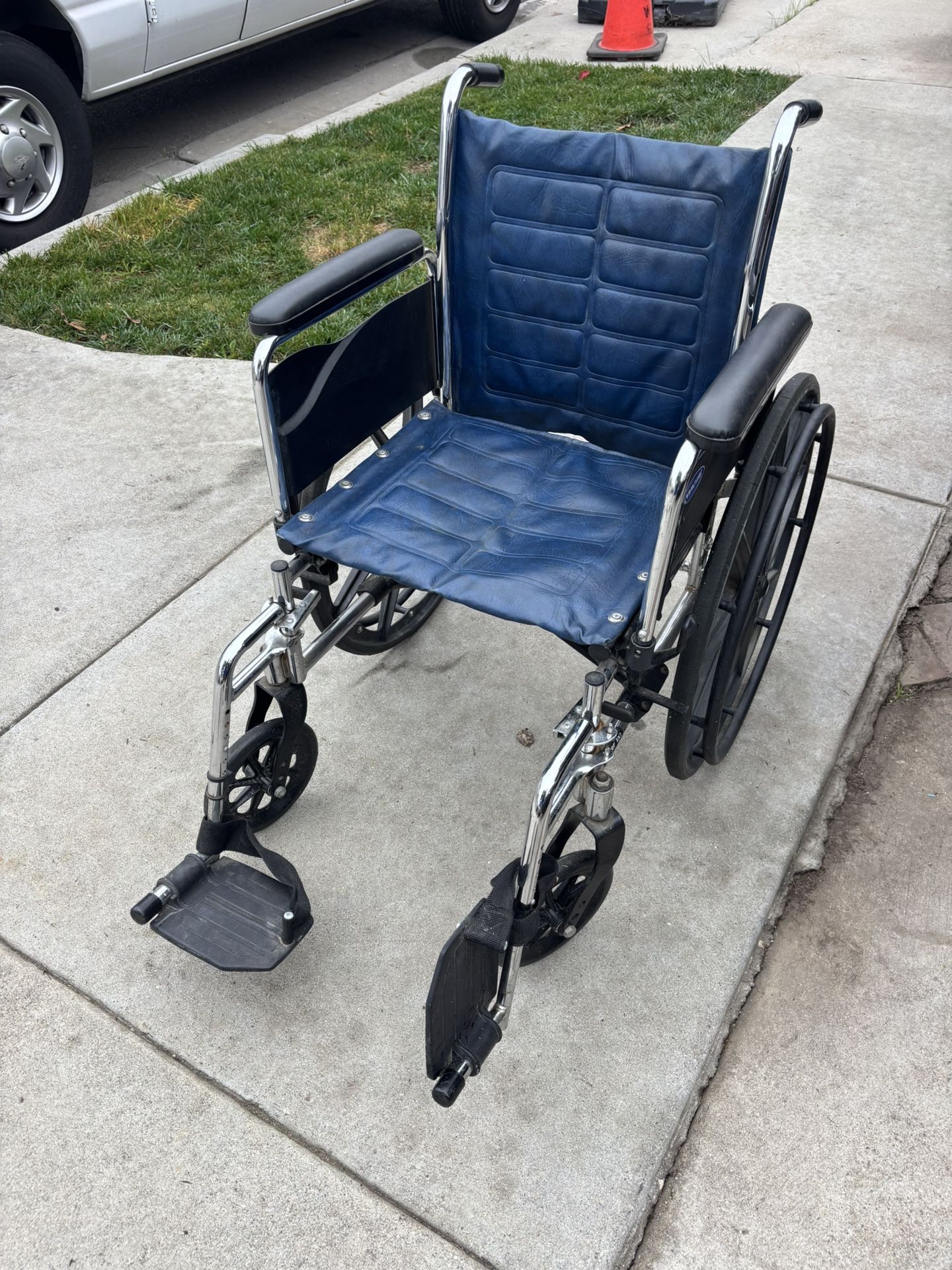 Wheelchair With Leg Supports