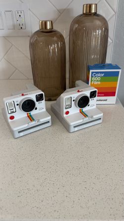 Polaroid cameras with film