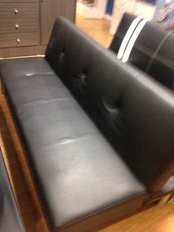 Brand new all black futon bed