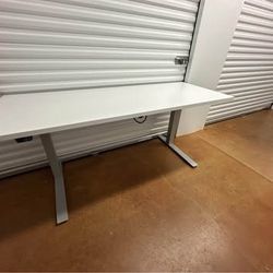 Used Knoll Office Desk 72x26x25 Model KHAT B2 Powered Up and Down raises up to 50 inches. 