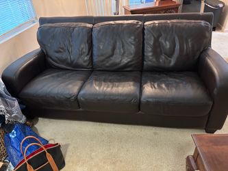 Free: Dark brown three seat sofa