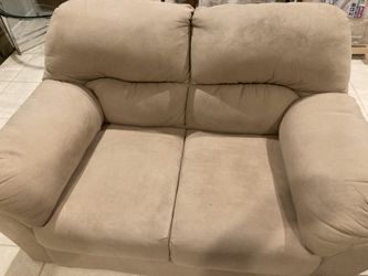 Micro FiberTan SLove Seat, In Great Condition. Brought Down From Our Home Up North.