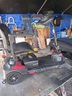 A scout three-wheel scooter 24 volt needs work and a battery only goes forward no reverse good for parts or rebuild