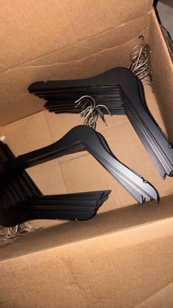 Retail grade wooden non slip hangers from North Face store clean out