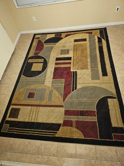 Home Dynamix Royalty Geometric Area Rug in Brown, Red, and Black. 7 ft 8 inches x 10 f 4 inches.