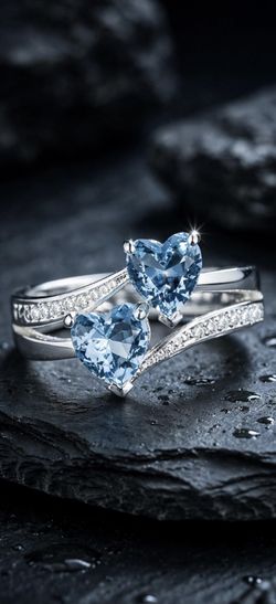 New double blue heart ring, silver-tone. $50. Available in 6, 6.5, 7, 7.5, 8, 8.5, 9, 10, 10.5. Message size.