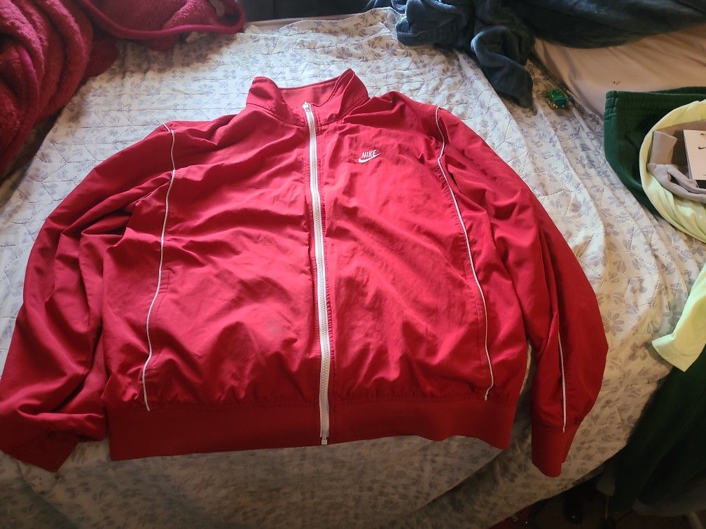 Red Nike parachute sweater