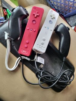 2 nintendo, we motion plus controllers and 2 nunchucks, excellent condition
