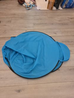 Blue Pop-Up Tent Folded Flat