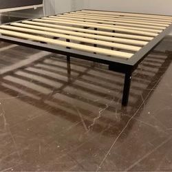 New Queen size platform bedframe with slats . New in box