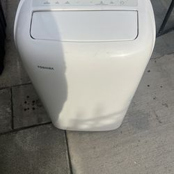 Used Toshiba RAC-PD0812CRRU portable air conditioner, versatile unit designed to cool, dehumidify, & circulate air.