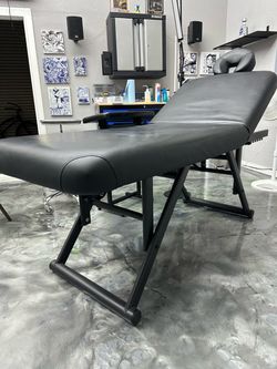 Massage table