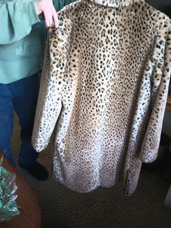 I have a fake fur leopard coat size , large , perfect condition