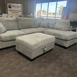 Light Gray Sectional Sofa And FREE storage Ottoman 